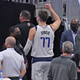 Luka Doncic waves to fans after being ejected from the game during the third quarter against the Cleveland Cavaliers at Rocket Mortgage Fieldhouse on Sunday.